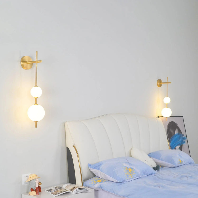 Stilfuld sfærisk glasvæglampe