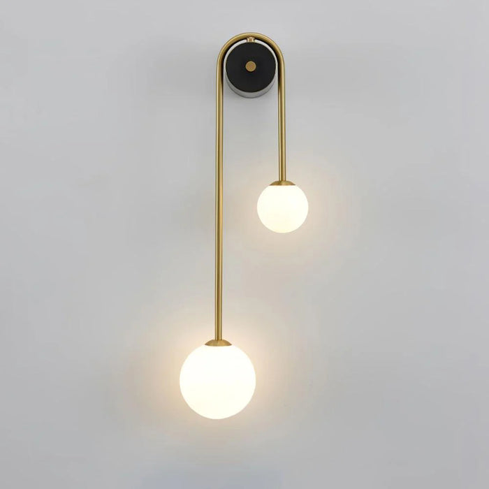 Luce murale dell'arco dorato