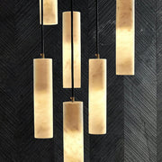 Lampe à suspension élégante en marbre cylindrique