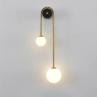 Luce murale dell'arco dorato
