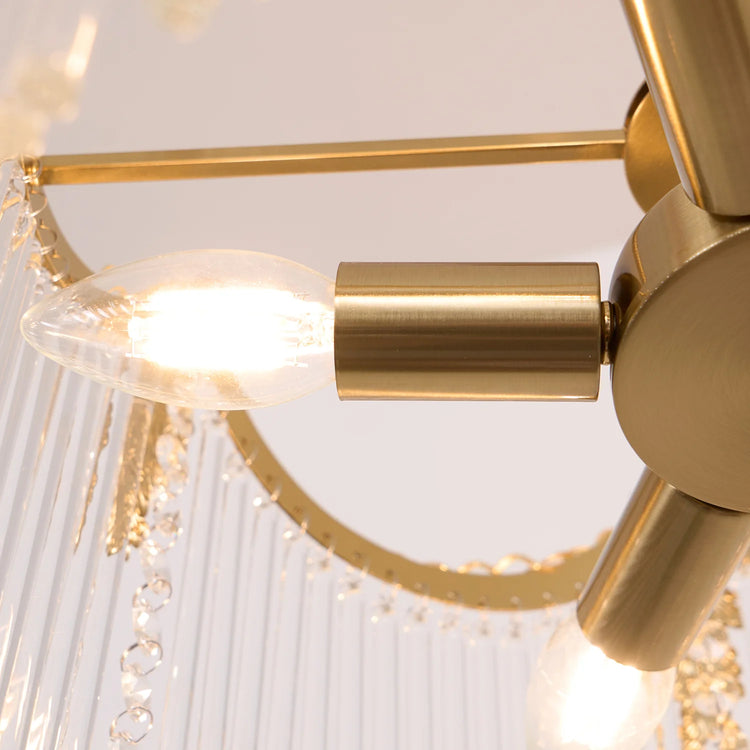 Moderne lysekrone med runde krystalelementer