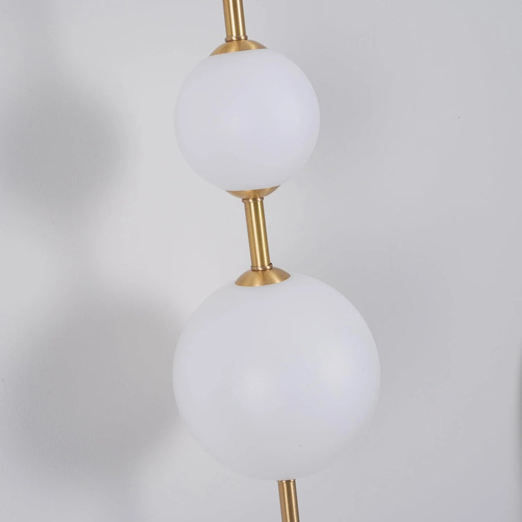 Stilfuld sfærisk glasvæglampe