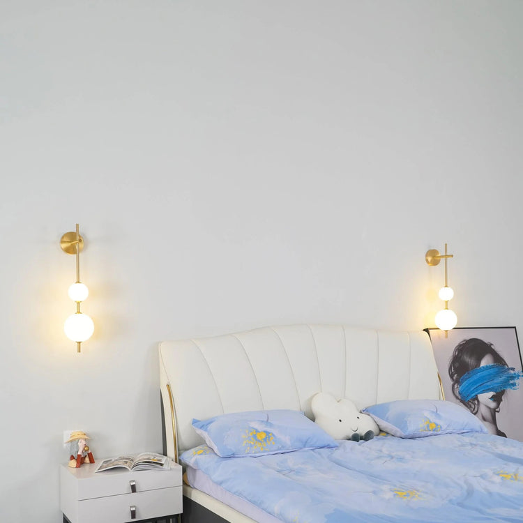 Stilfuld sfærisk glasvæglampe