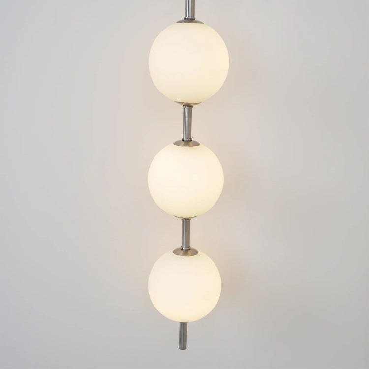 Stilfuld sfærisk glasvæglampe