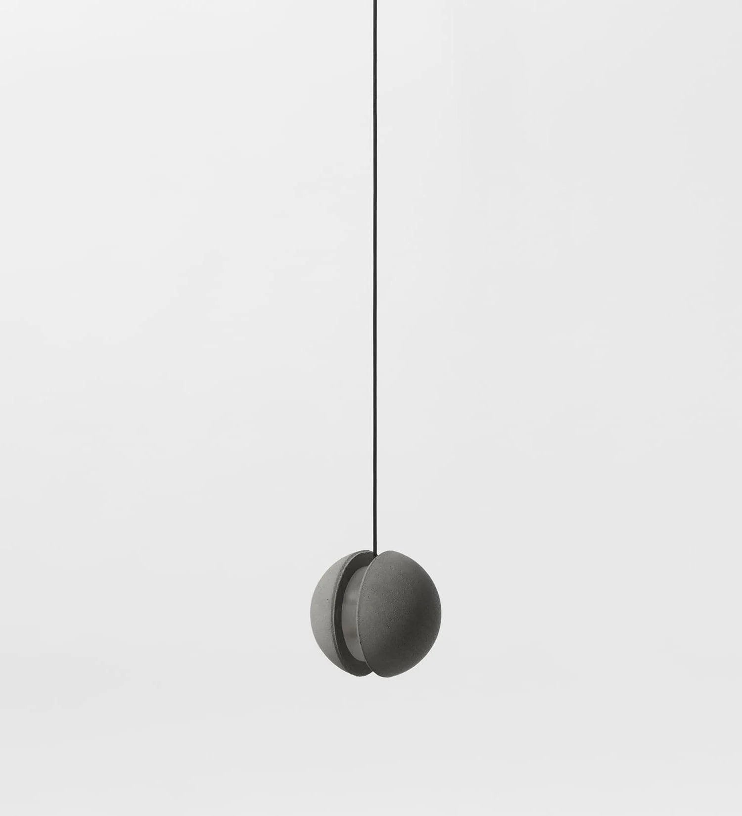Suspension ronde minimaliste en béton