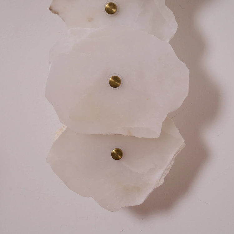 Stilfuld abstrakt marmor væglampe