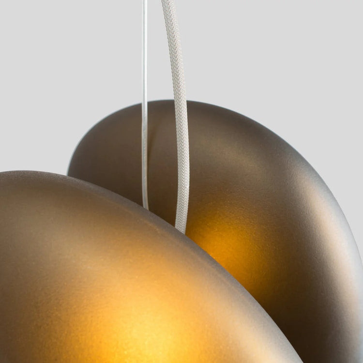 Stilfuldt ovalt glaspendellys