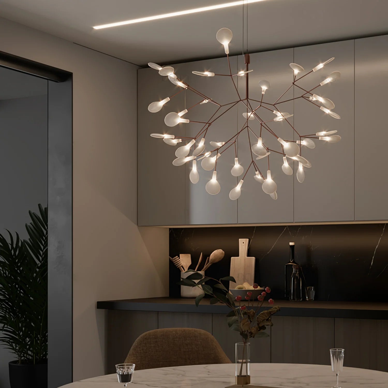 Lampadario luminoso in oro rosa