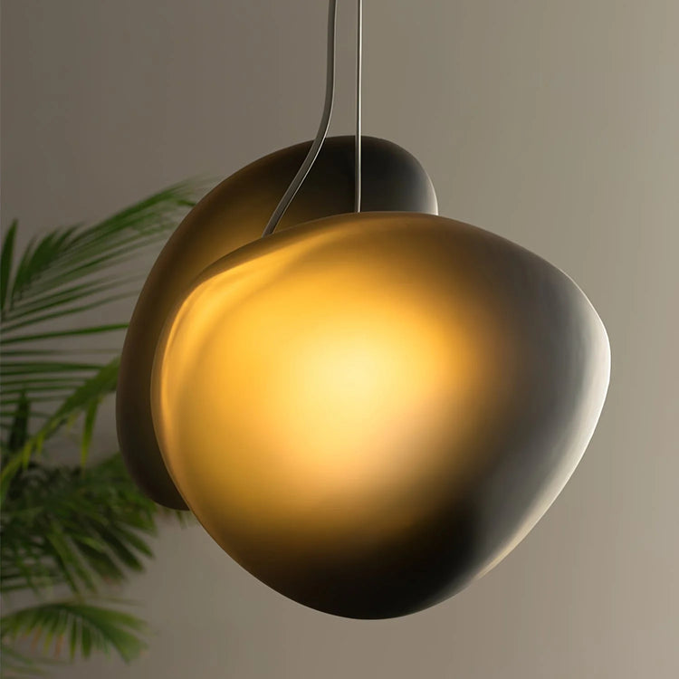 Stilfuldt ovalt glaspendellys