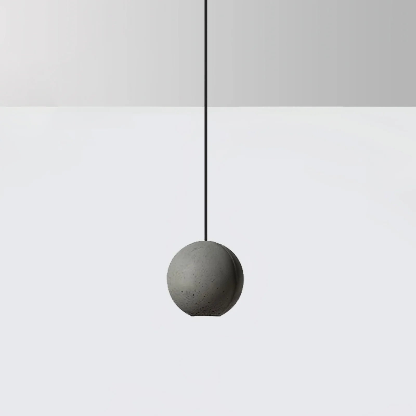 Suspension ronde minimaliste en béton