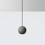Suspension ronde minimaliste en béton