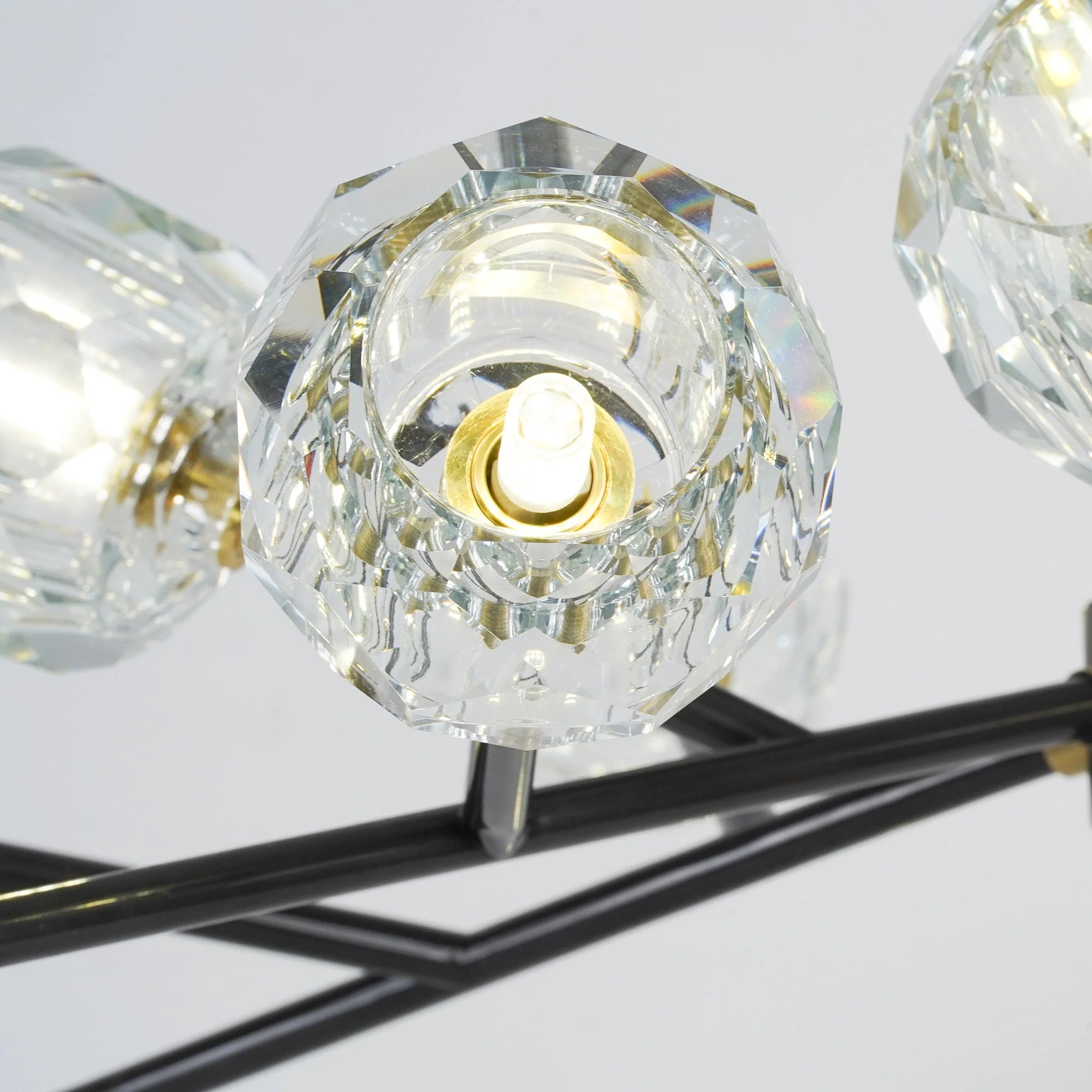 Lampadario a cascata con sfera di vetro